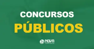 Mão segurando uma caneta, preenchendo um formulário em papel com texto sobre as imagens Concursos Públicos