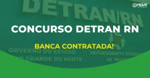 Imagem do concurso Detran RN, com fundo verde e o prédio do Detran Rio Grande do Norte desfocado ao fundo. Em destaque, o texto “Concurso Detran RN” e, logo abaixo, “Banca contratada!” em amarelo. No canto superior direito, aparece a logomarca da Nova Concursos.