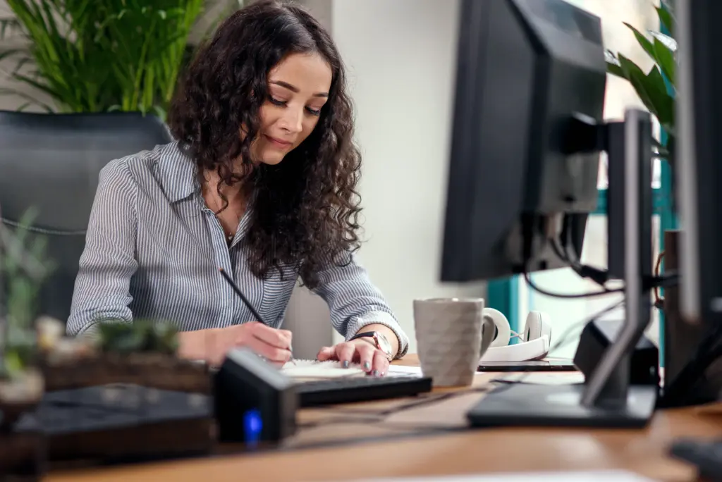 beautiful female office worker writes something notebook creative people advertising business concept 1